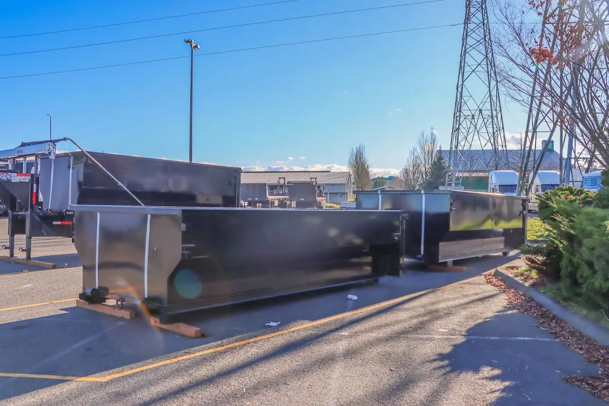 Roll-off dumpster ready for waste disposal at job site for 4 Yard Dumpster Rental in Tecumseh